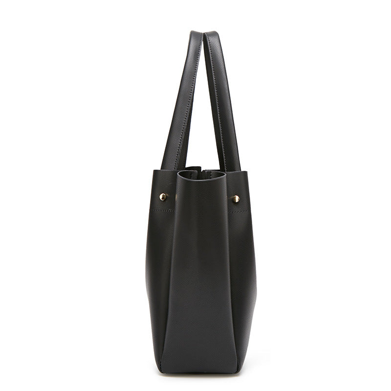 Damen Tragetasche mit modernem minimalistischen Design und eleganter Oberflächenstruktur Nord Taschen