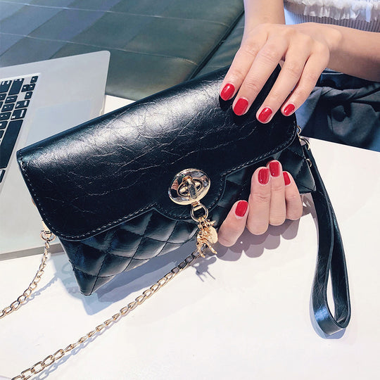 Damen Clutch-Tasche mit eleganter Steppung und praktischer Kette Nord Taschen