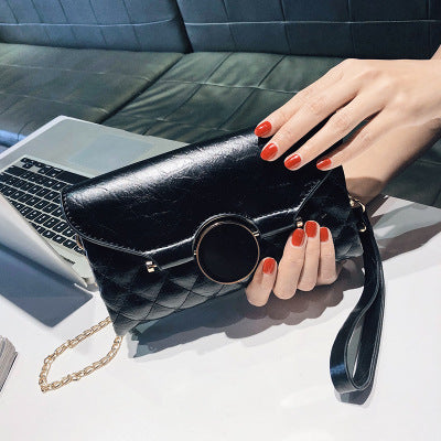 Damen Clutch-Tasche mit modernem Kettendesign und eleganter Steppung Nord Taschen