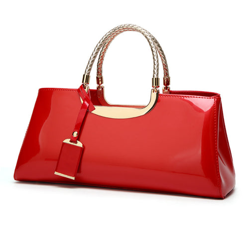 Damen elegante Handtasche mit glänzendem Finish und geflochtenen Griffen Nord Taschen