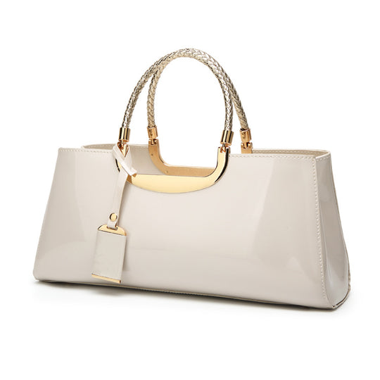 Damen elegante Handtasche mit glänzendem Finish und geflochtenen Griffen Nord Taschen