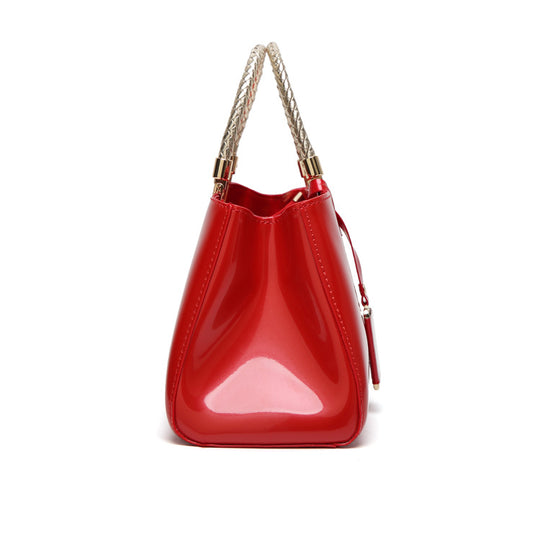 Damen elegante Handtasche mit glänzendem Finish und geflochtenen Griffen Nord Taschen