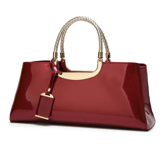 Damen elegante Handtasche mit glänzendem Finish und geflochtenen Griffen Nord Taschen