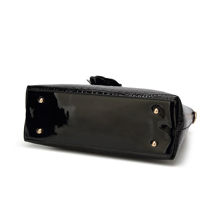 Damen Handtasche mit eleganter Kroko-Prägung und luxuriösen Details Nord Taschen