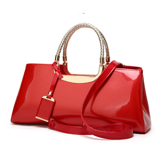 Damen elegante Handtasche mit glänzendem Finish und geflochtenen Griffen Nord Taschen