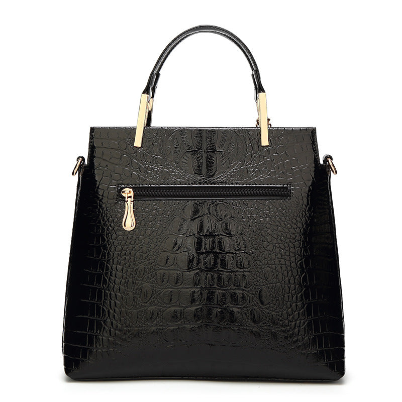 Damen Handtasche mit eleganter Kroko-Prägung und luxuriösen Details Nord Taschen