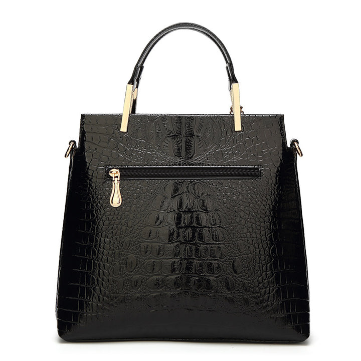 Damen Handtasche mit eleganter Kroko-Prägung und luxuriösen Details Nord Taschen