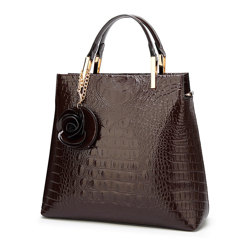 Damen Handtasche mit eleganter Kroko-Prägung und luxuriösen Details Nord Taschen