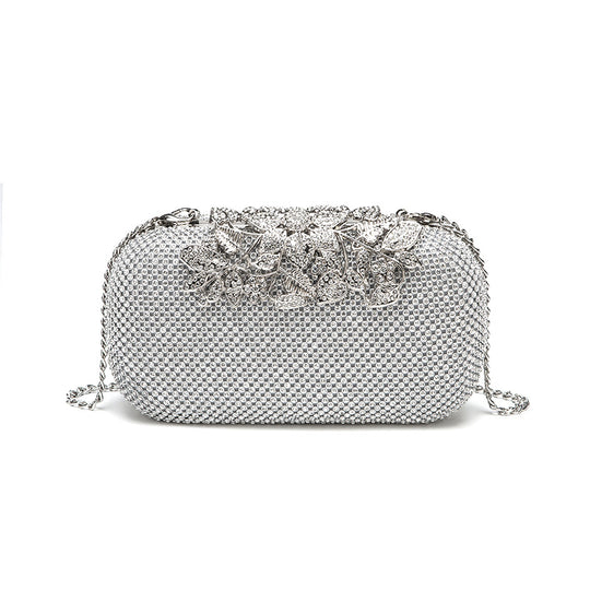 Damen Clutch mit funkelndem Strassdesign und floralem Akzent Nord Taschen