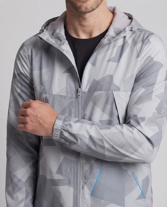 Herren Atmungsaktive Windbreaker‑Kapuzenjacke mit urbanem Grafik‑Muster und verschweißten Reißverschlusstaschen Nord Taschen