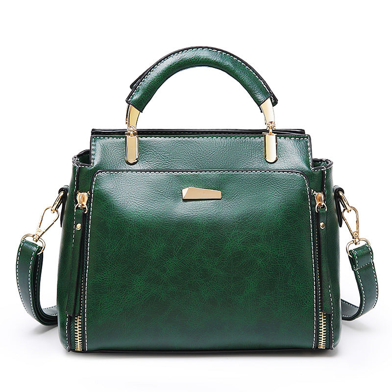 Damen Handtasche mit strukturiertem Kunstleder und goldenen Akzenten Nord Taschen