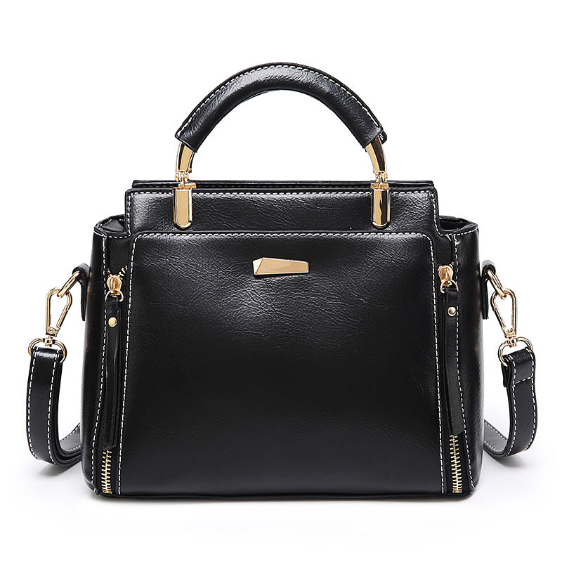 Damen Handtasche mit strukturiertem Kunstleder und goldenen Akzenten Nord Taschen
