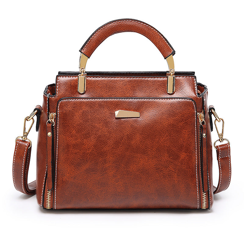 Damen Handtasche mit strukturiertem Kunstleder und goldenen Akzenten Nord Taschen