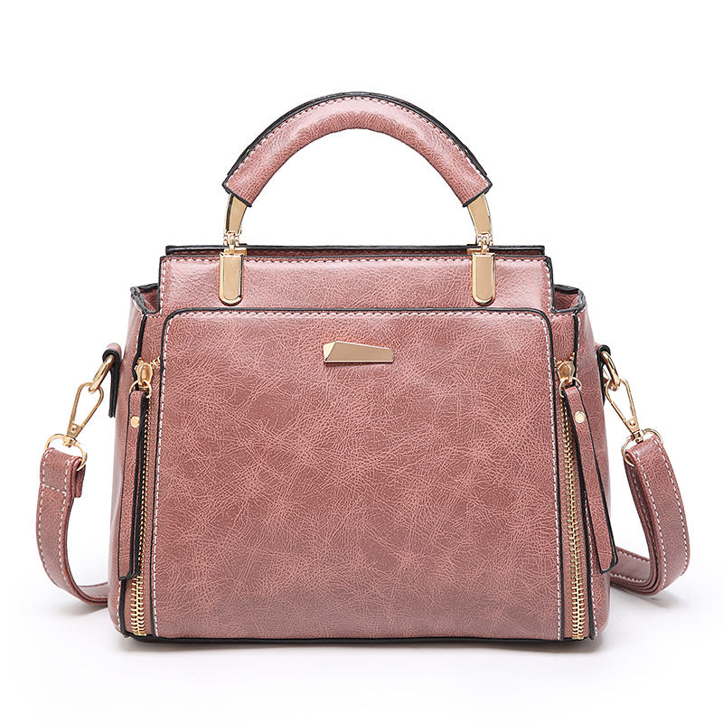 Damen Handtasche mit strukturiertem Kunstleder und goldenen Akzenten Nord Taschen