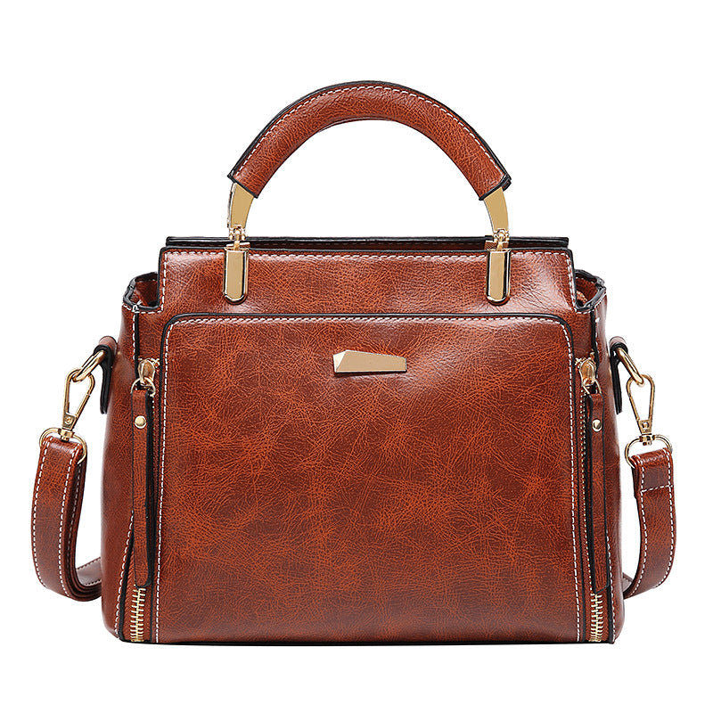 Damen Handtasche mit strukturiertem Kunstleder und goldenen Akzenten Nord Taschen