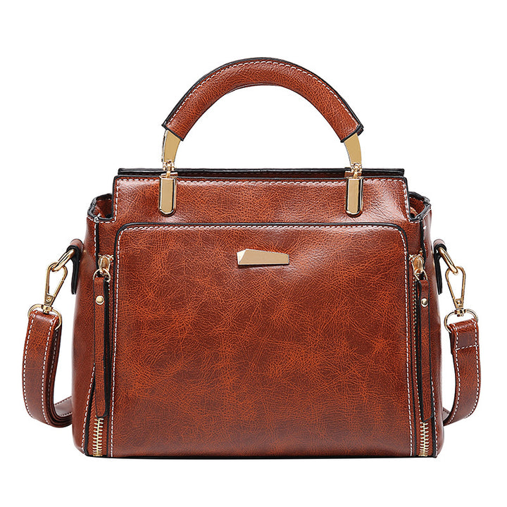 Damen Handtasche mit strukturiertem Kunstleder und goldenen Akzenten Nord Taschen
