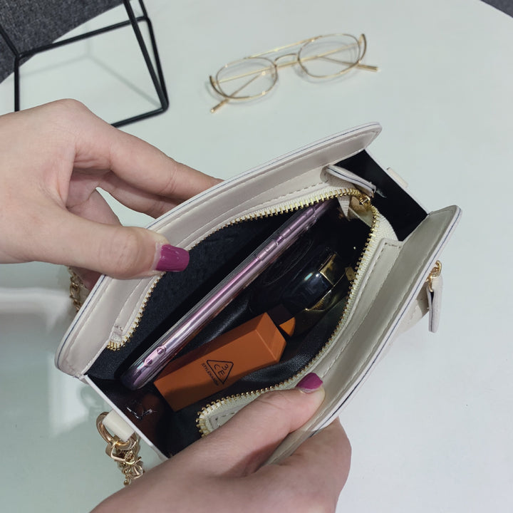 Damen Clutch-Tasche mit eleganter Steppoptik und goldenen Details Nord Taschen