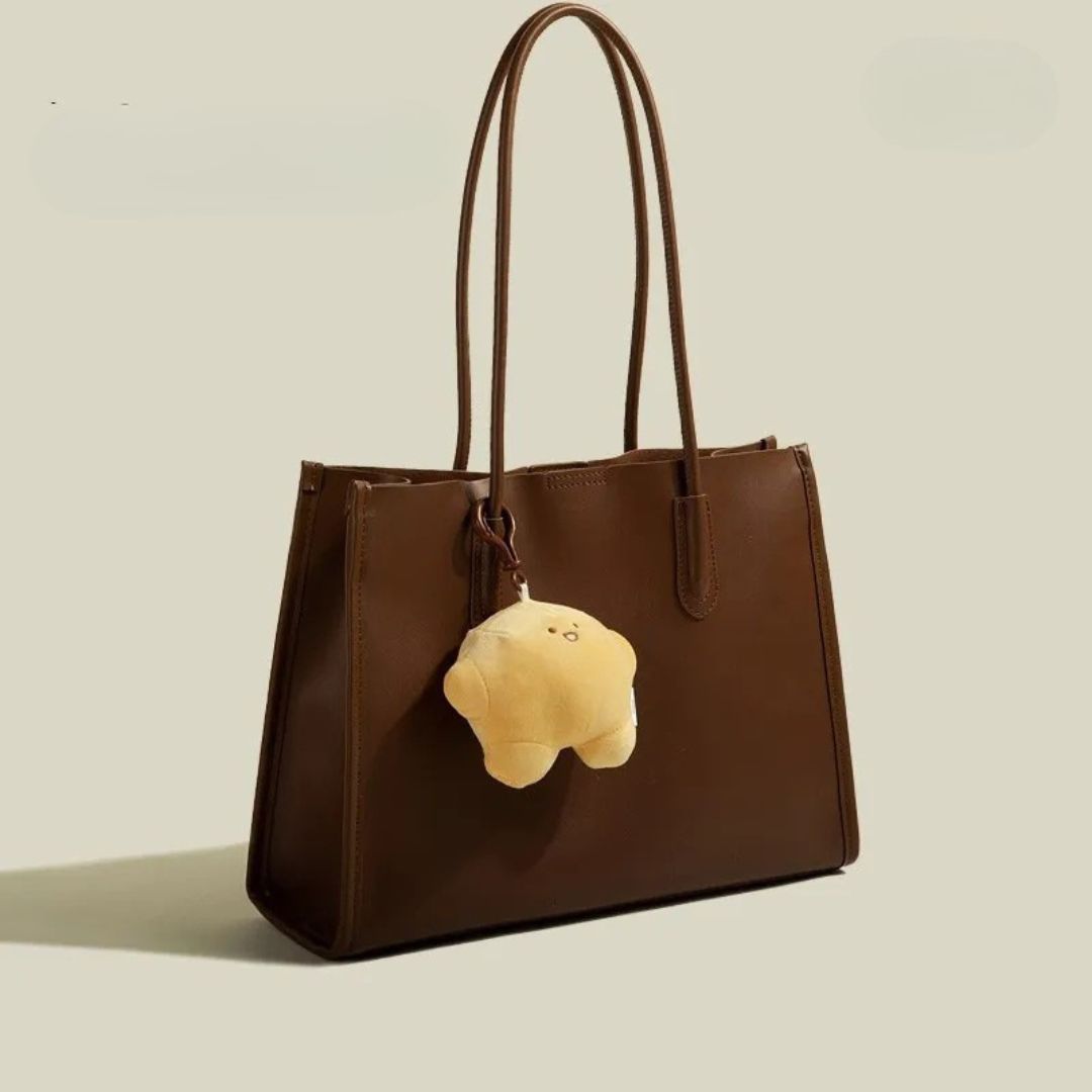 Nord Taschen | Handtasche für Damen - Praktisches Design mit süßem Anhänger und geräumigem Innenraum