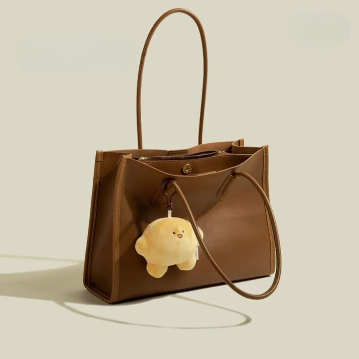 Nord Taschen | Handtasche für Damen - Praktisches Design mit süßem Anhänger und geräumigem Innenraum