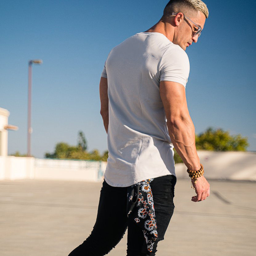 Herren nan figurbetontes Kurzarmshirt aus elastischem Baumwollmix mit verlängertem Saum