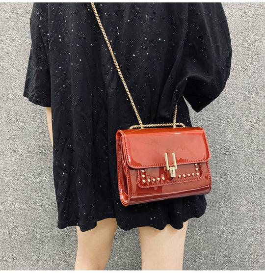 Damen Clutch-Tasche mit glamorous Oberfläche und eleganter Kettenverzierung Nord Taschen