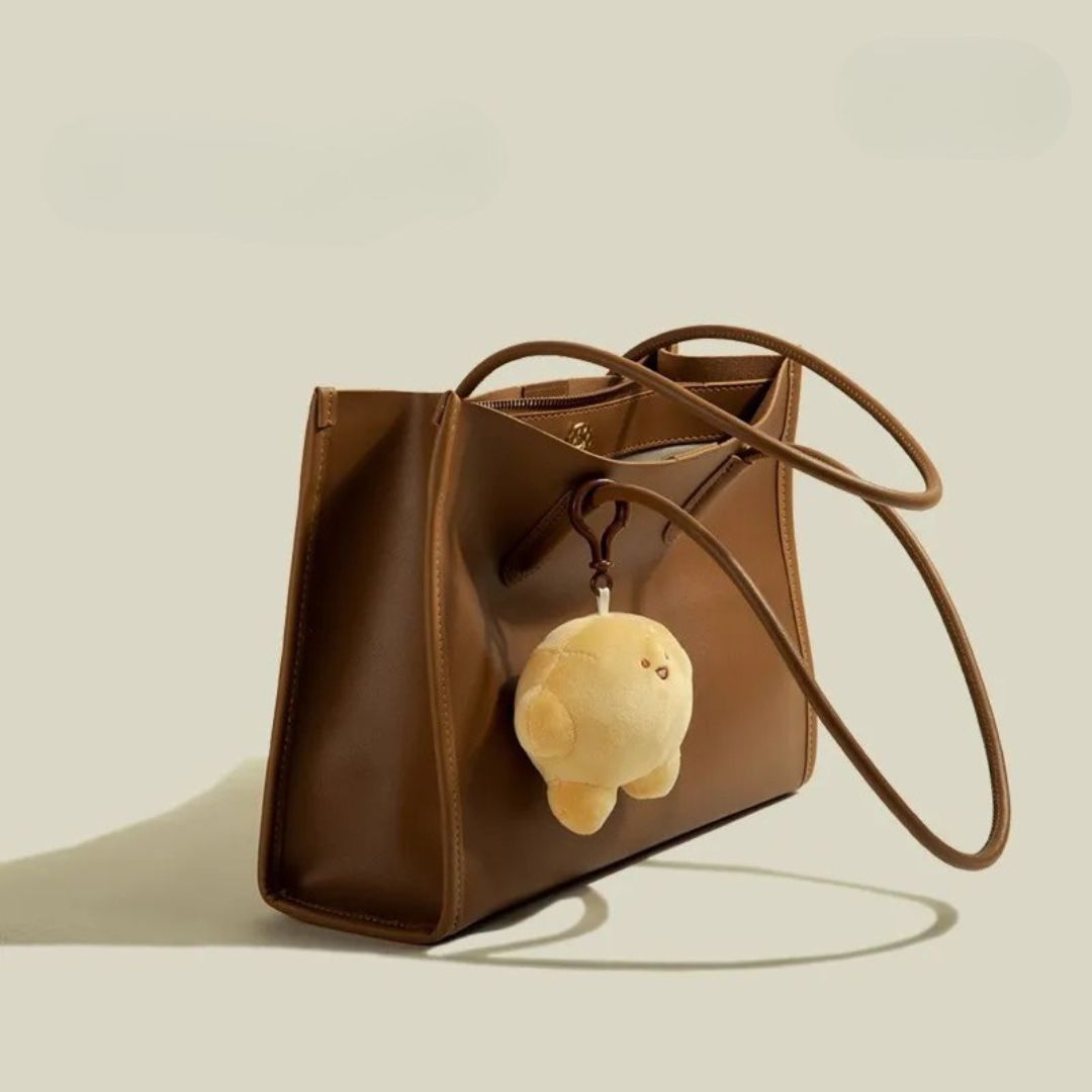 Nord Taschen | Handtasche für Damen - Praktisches Design mit süßem Anhänger und geräumigem Innenraum