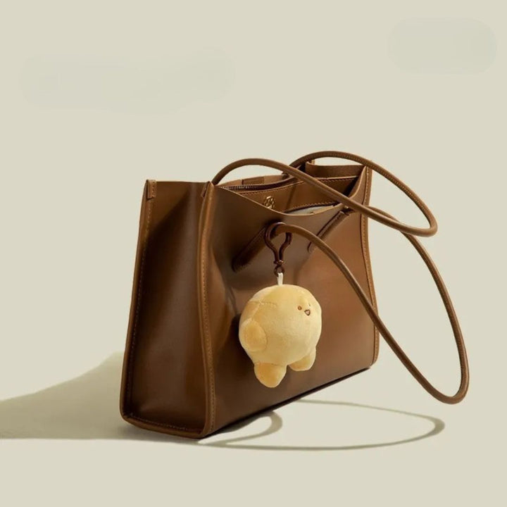 Nord Taschen | Handtasche für Damen - Praktisches Design mit süßem Anhänger und geräumigem Innenraum