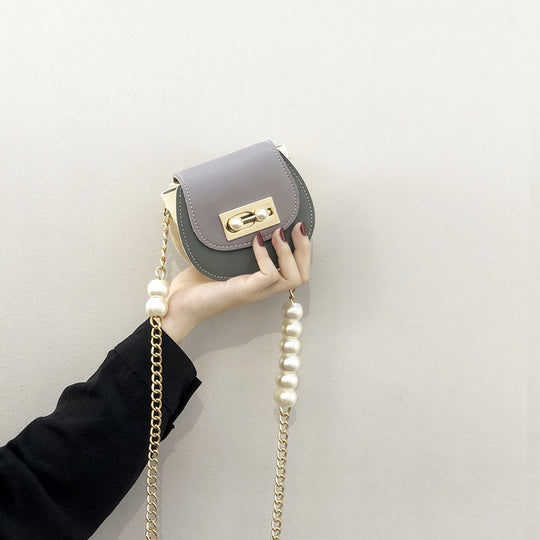 Damen Clutch-Tasche mit perlverziertem Kettenriemen und elegante Verschluss Nord Taschen