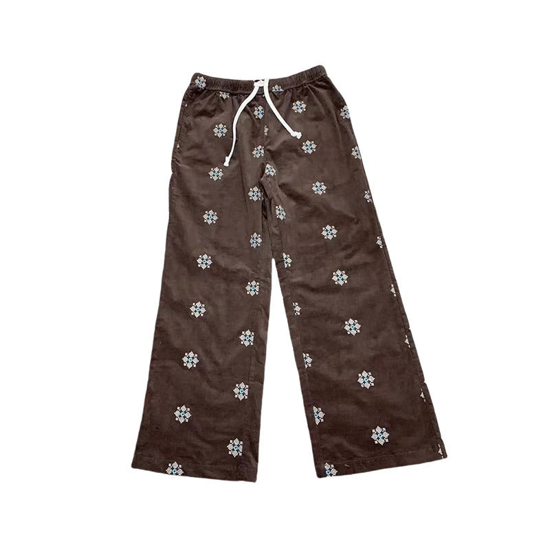 Cord-Hose mit Stickerei und ausgestelltem Bein