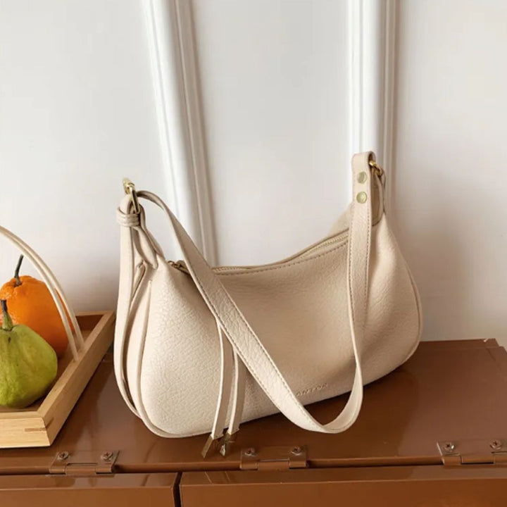 Nord Taschen | Umhängetasche für Damen - Schlichte Schultertasche im Dumpling-Design mit verstellbarem Riemen