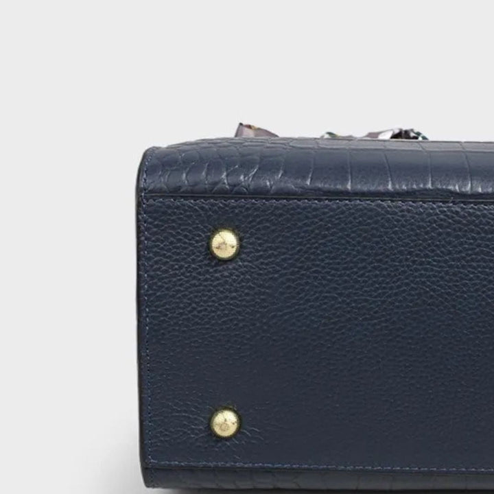 Nord Taschen | Handtasche für Damen - Großzügige Tasche mit strukturiertem Design und dekorativem Schleifenanhänger