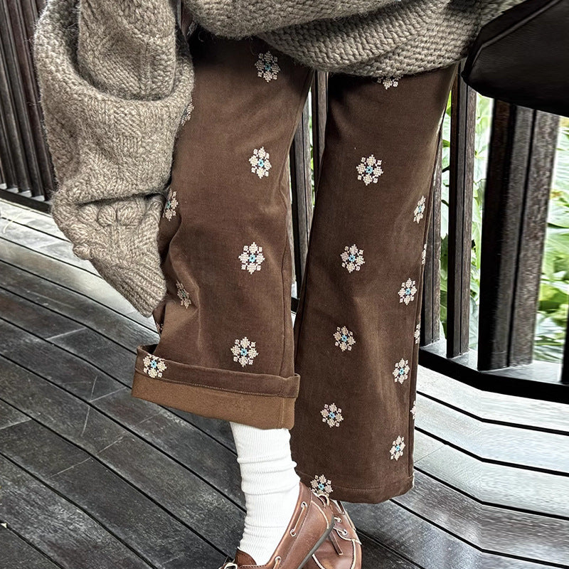 Cord-Hose mit Stickerei und ausgestelltem Bein