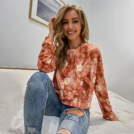 Damen locker geschnittenes Sweatshirt mit Gänseblümchen‑Print Batik‑Optik und Kängurutasche Nord Taschen