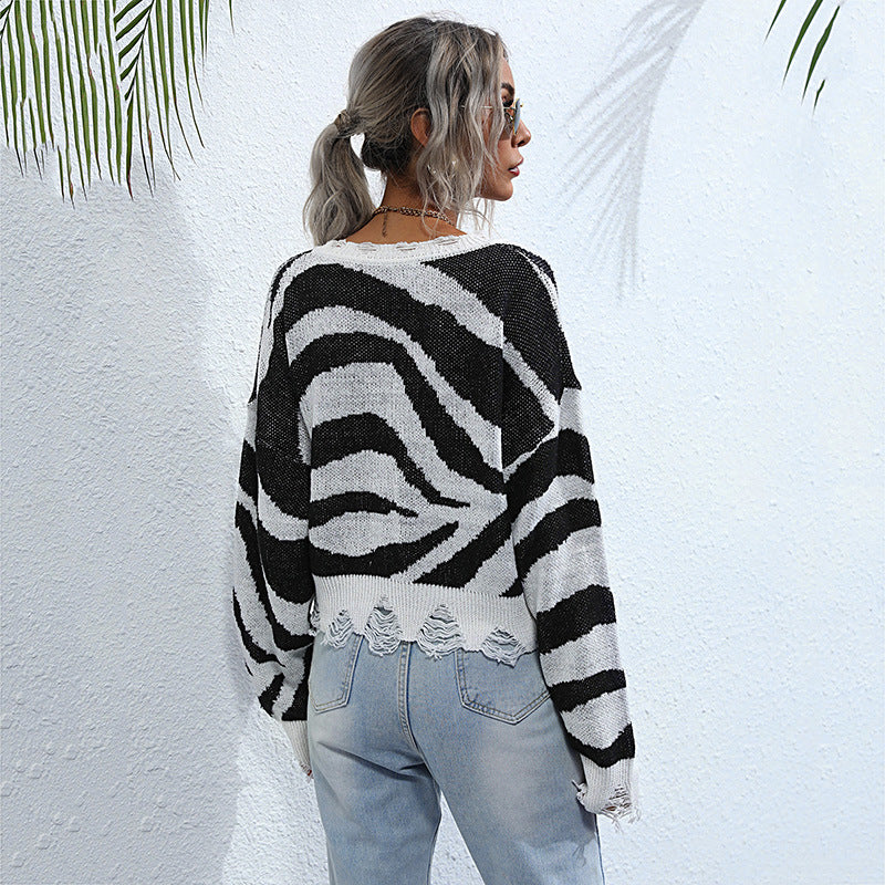Damen Oversize V-Ausschnitt Strickpullover mit Zebramuster und ausgefranstem Saum Nord Taschen