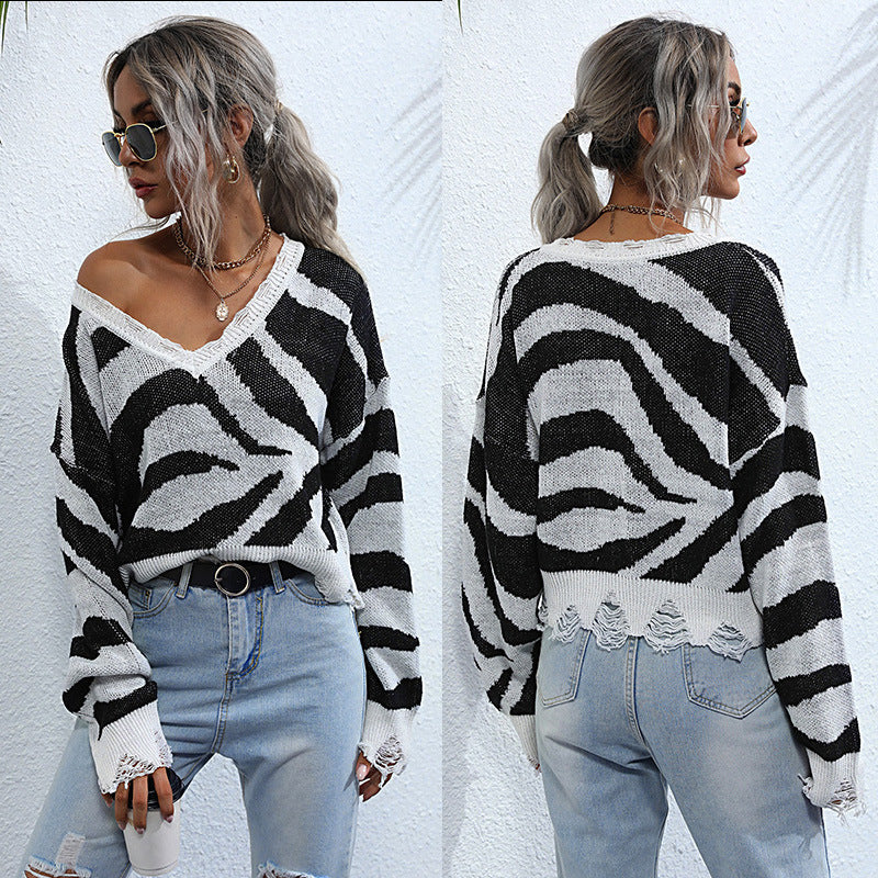 Damen Oversize V-Ausschnitt Strickpullover mit Zebramuster und ausgefranstem Saum Nord Taschen