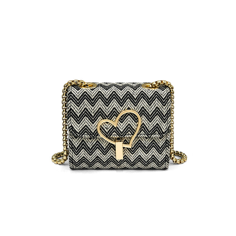 Damen Designer Clutch mit verspieltem Herzschloss Nord Taschen