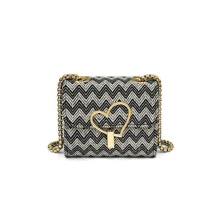 Damen Designer Clutch mit verspieltem Herzschloss Nord Taschen