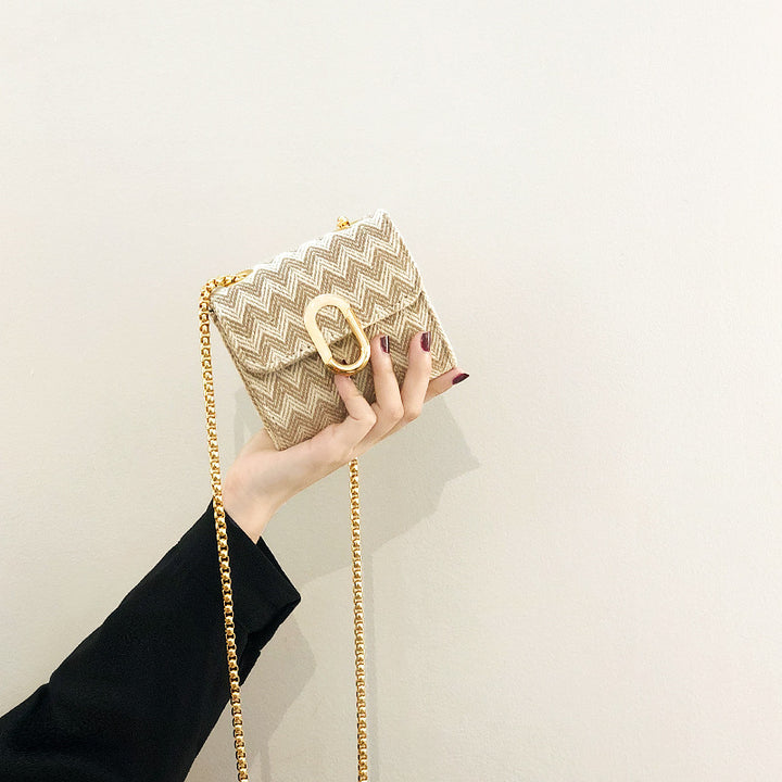 Damen Umhängetasche mit elegantem Zickzack-Muster und goldfarbener Schnalle Nord Taschen