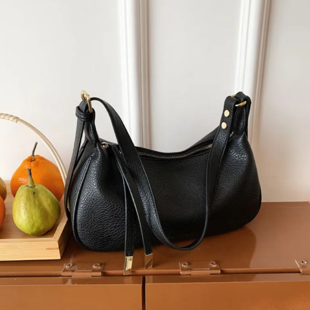 Nord Taschen | Umhängetasche für Damen - Schlichte Schultertasche im Dumpling-Design mit verstellbarem Riemen