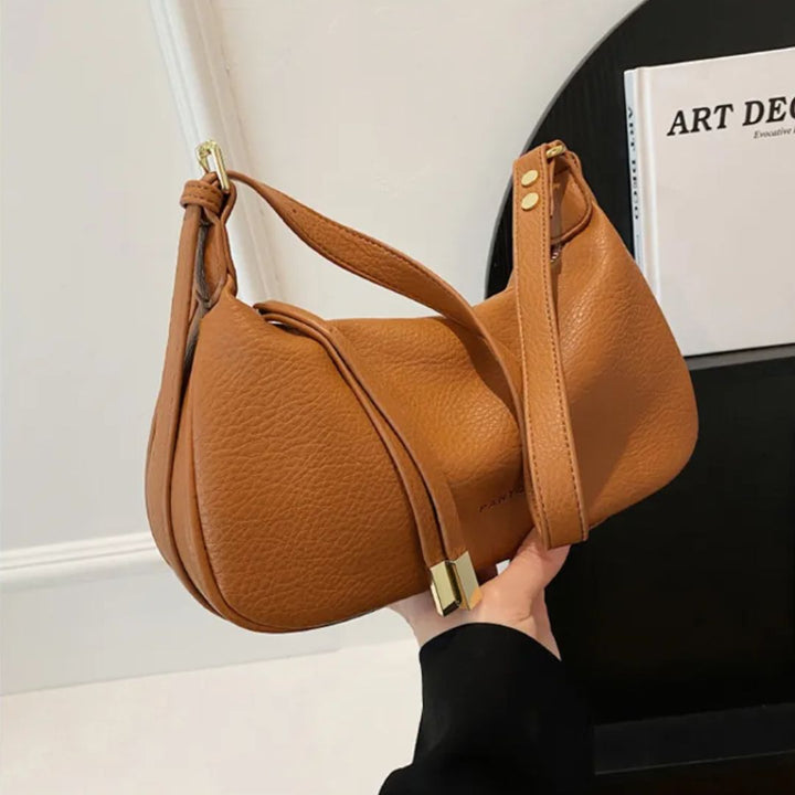 Nord Taschen | Umhängetasche für Damen - Schlichte Schultertasche im Dumpling-Design mit verstellbarem Riemen