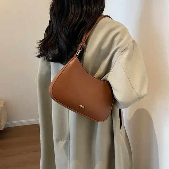 Nord Taschen | Umhängetasche für Damen - Elegante Schultertasche aus hochwertigem Leder mit praktischer Form