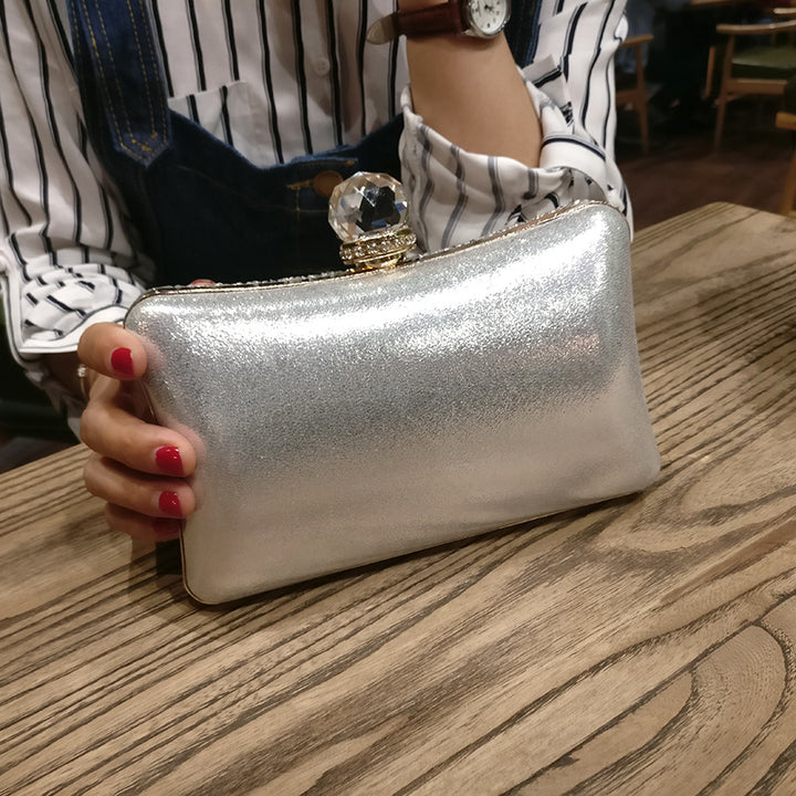 Damen Clutch mit funkelndem Steinbesatz Nord Taschen