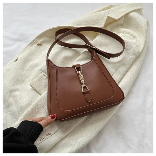 Nord Taschen | Umhängetasche für Damen - Schlichte Schultertasche mit stilvollem Design und praktischer Schnalle