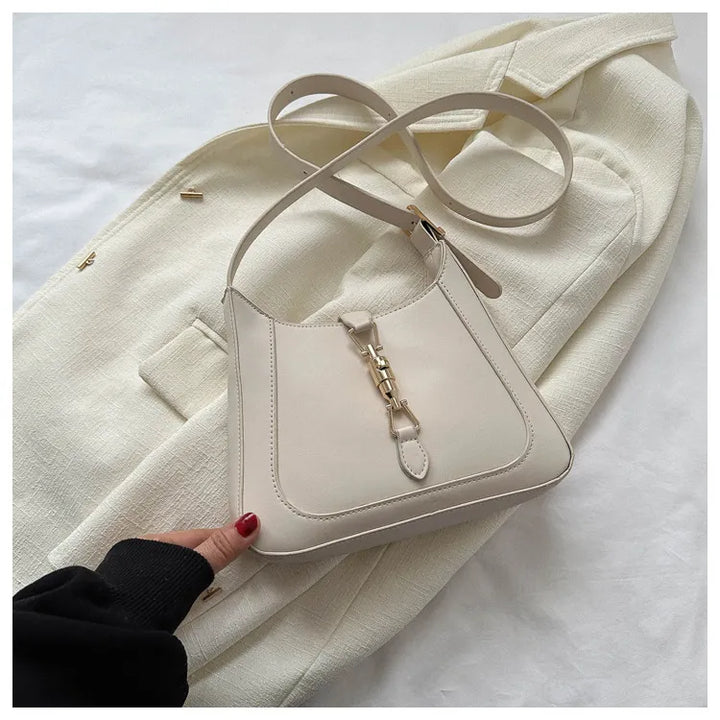 Nord Taschen | Umhängetasche für Damen - Schlichte Schultertasche mit stilvollem Design und praktischer Schnalle