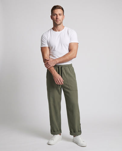 Unisex Weite Cargo‑Style Hose mit Tunnelzugbund, aufgesetzten Taschen und Knopf‑Saum Nord Taschen