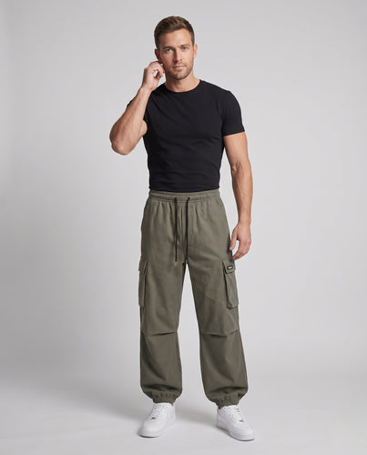 Unisex Locker geschnittene Cargo‑Palazzohose im Balloon‑Silhouette mit elastischem Bund und großen Klappentaschen Nord Taschen