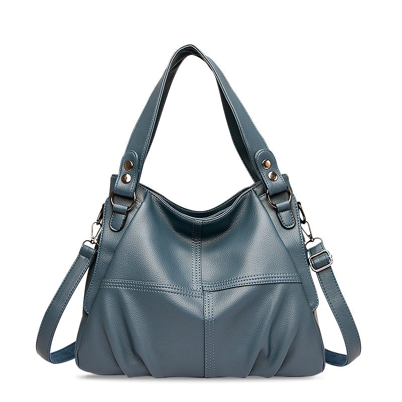Nord Taschen | Große vegane Kuhfell-Hobo-Schultertasche