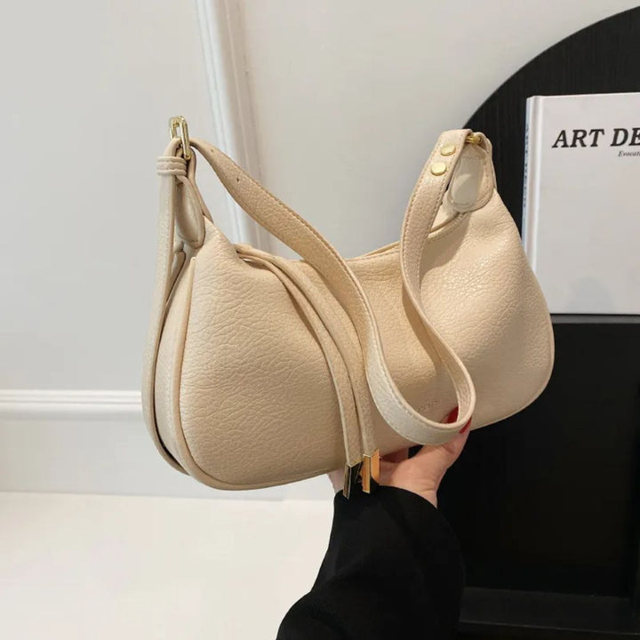 Nord Taschen | Umhängetasche für Damen - Schlichte Schultertasche im Dumpling-Design mit verstellbarem Riemen