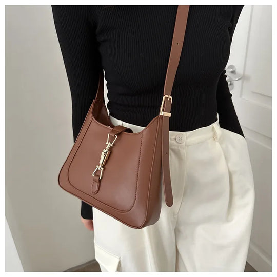 Nord Taschen | Umhängetasche für Damen - Schlichte Schultertasche mit stilvollem Design und praktischer Schnalle