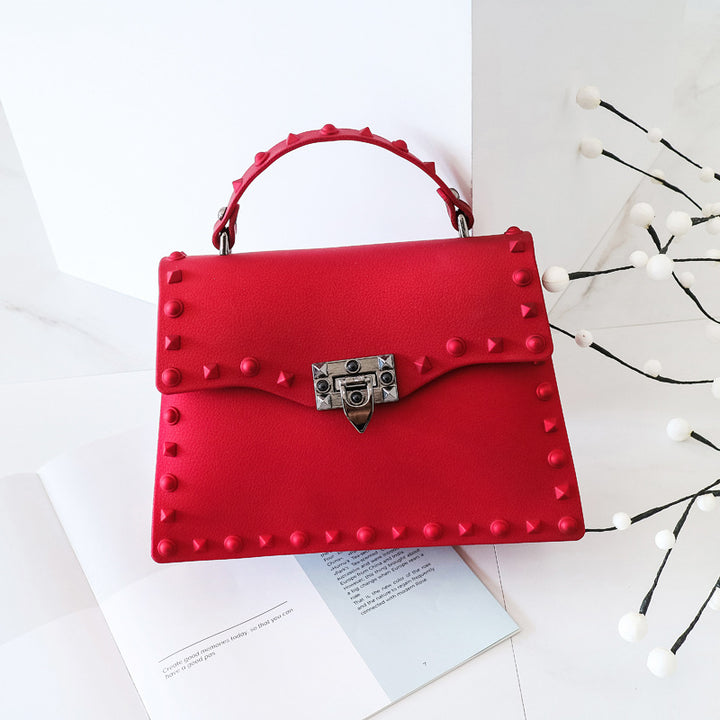 Damen Handtasche mit auffälligen Nieten Nord Taschen